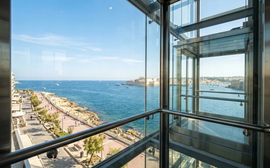Panoramic glass lift on a seafront apartment building in Sliema
