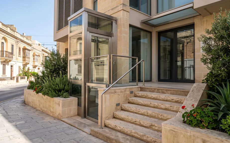 Glazed platform lift at the entrance of a medical clinic in Mosta