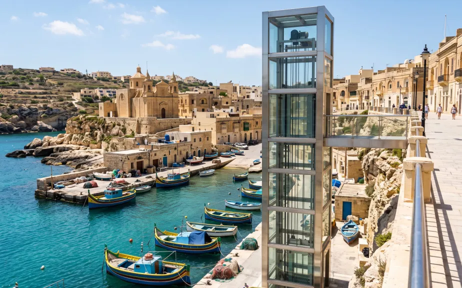 Public glass lift by a harbour in Gozo